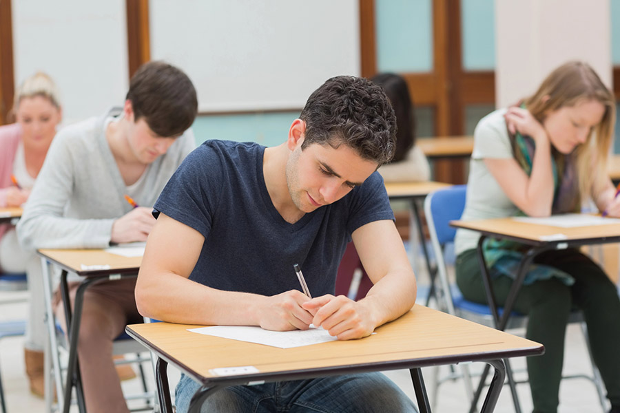 Students taking a test in a classroom in White Plains